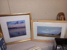 A pair of prints of beach scenes