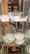 A nice mixed lot of glass bowls, 2 shelves