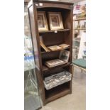 A modern bookcase, dark wood