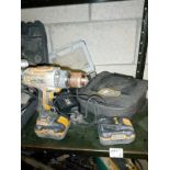 A JCB battery drill with 2 batteries, case and charger