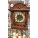 A wooden mantel clock. A/F