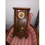 A late 19th/early 20th century wall clock, COLLECT ONLY.