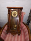 A late 19th/early 20th century wall clock, COLLECT ONLY.