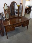 A dark wood dressing table with mirror. COLLECT ONLY.