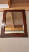 A wood framed mirror, 54 x 70 cm, COLLECT ONLY.