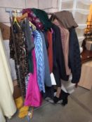 A good lot of ladies and gents clothing - shirts, shorts, jackets, skirts, man's dress suit etc.,