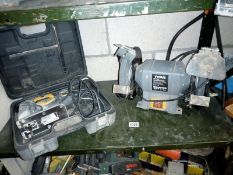A JCB cased jigsaw and a titan bench grinder