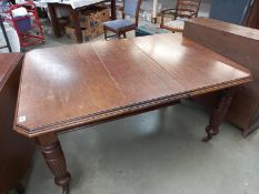 An early 20th century dining table. COLLECT ONLY.