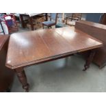 An early 20th century dining table. COLLECT ONLY.