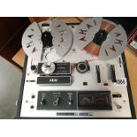 AN Akai X5000L reel to reel 4 track player with a large amount of tapes