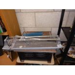 A 10" diamond saw tile cutter.