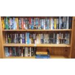 3 shelves of paperback and hardback books including James Patterson