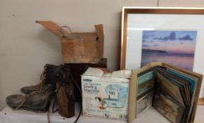 A mixed lot including postcards, boots, mini sewing machine and others