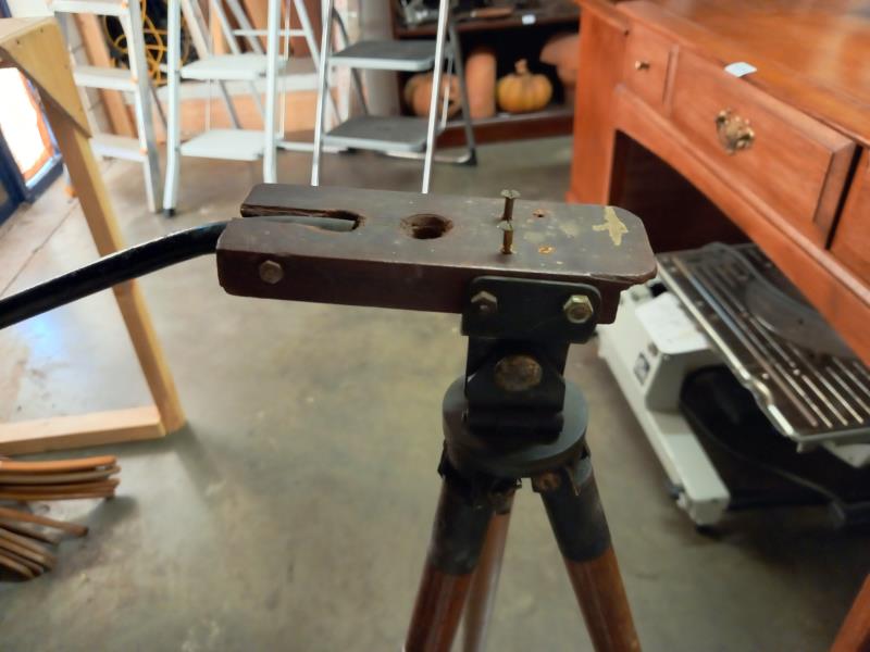 A vintage camera tripod on spike legs and a brass spent shell - Image 6 of 11