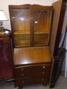 A lead glazed bureau bookcase, 77 cm wide, 46 cm deep and 180cm high. COLLECT ONLY.