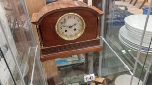 A wooden mantel clock. A/F