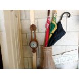 A banjo barometer, jewellery hooks and a walking stick/umbrella pot