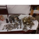 A large lot of silver plate including teaset, coffee pots etc.,