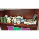 A quantity of cups, plates, salt and pepper pots etc