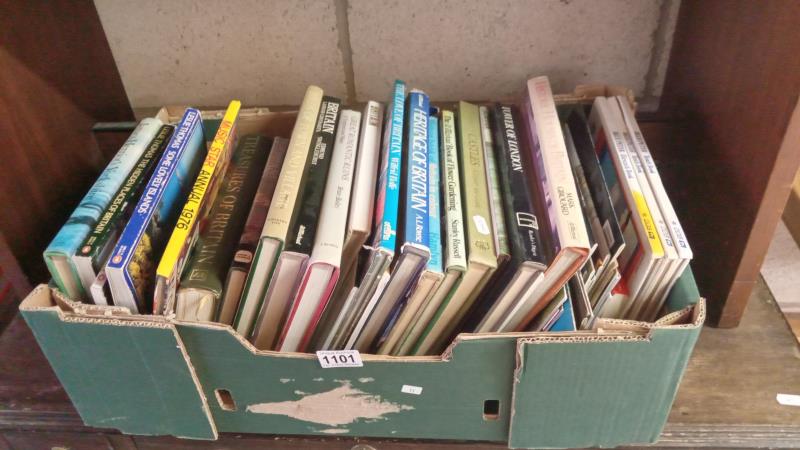 A box of books, most reference