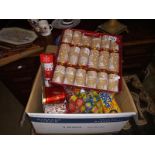 A box of Christmas crackers & party poppers etc.