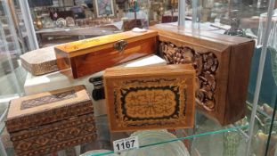 An inlaid box, 2 carved boxes and 3 jewellery boxes