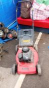 A Briggs & Stratton working petrol mower with grass box. Collect Only.
