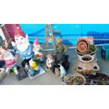 A quantity of garden gnomes & pots etc. Collect Only.