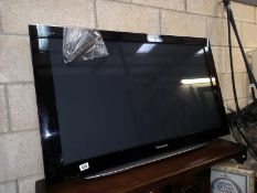 a 46" Panasonic flat screen wall mounted tv and remote. Collect Only.