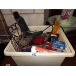 A box of tools, g clamps, bike light etc