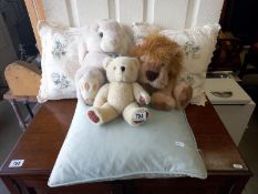 3 cuddly toys and 3 cushions