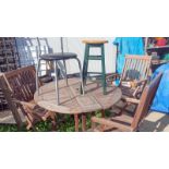 A wooden table & chairs with stools. Collect Only.