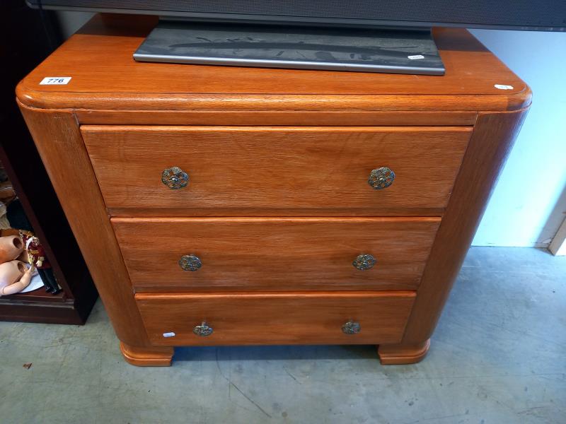 A teak veneered 1930's 3 drawer bedroom chest. Collect Only.