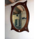 An oak mirror. 86cm x 60cm. Collect Only.
