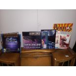 A quantity of Star Trek calendars and others