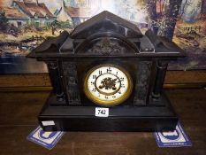 An old style mantel clock, springs ok. (no key or pendulum)