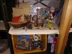 2 shelves of toys including some Playmobil
