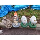A quantity of concrete garden ornaments being tortoise, cat, painted gnome & 2 painted doves etc.