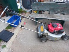 A Honda petrol mower. Collect Only.
