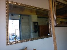 A gilt framed bevel edged mirror. COLLECT ONLY.