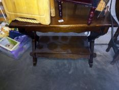 An oak coffee table with lower shelf. Collect Only.