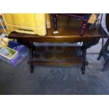 An oak coffee table with lower shelf. Collect Only.