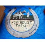 A Red House Farm sign