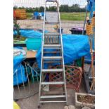 An aluminium step ladder & a decorative wooden ladder. Collect Only.