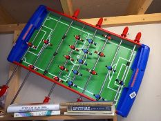 A table top football game with ball. Collect Only.