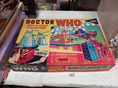 A boxed Chad Valley Doctor Who give a show projector & slides