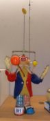 A vintage Japanese battery operated performing clown. Working when tested.