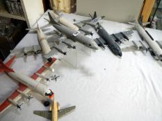 A selection of assembled plastic model aircraft from kits