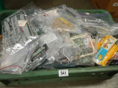 A large box of plastic model kits of aircraft, military vehicles and commercial etc. No boxes or