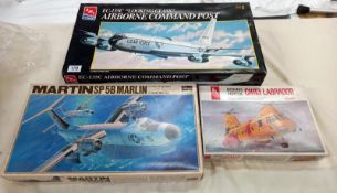 3 aircraft model kits including Amt Ertl 8955, Hasegawa K9 Hobbycraft HC 2301, completeness unknown